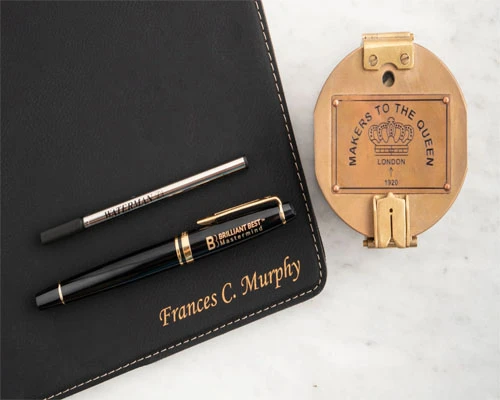 Laser engraving on business pen & pen pad Laser engraving on business pen & pen pad